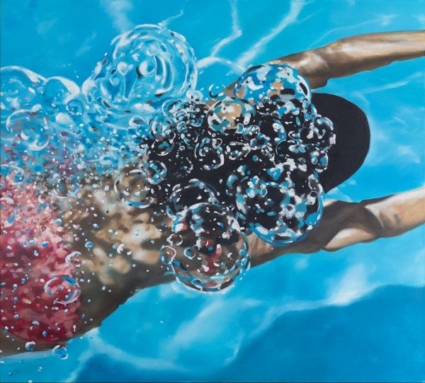 A person swimming underwater, bubbles around them, blue pool water, swimming cap and swimwear, graceful glide.