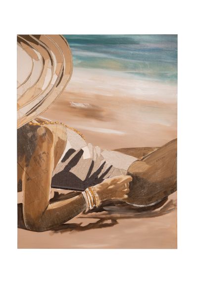 A person wearing a sun hat lies on a beach, reading a big book or notebook, with the sea and sand behind them.